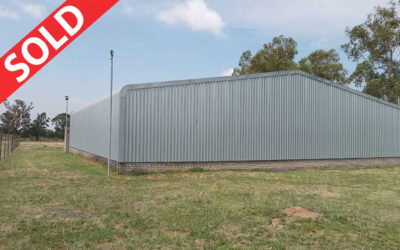 PLOT WITH WAREHOUSE, STORAGE FACILITES, CARPORTS ETC.